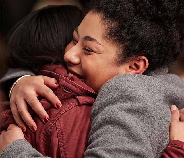 Women Hugging 